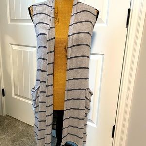 Sleeveless open sweater